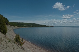 The fossiliferous cliff at Miguasha and the estuary of the Ristigouche River.