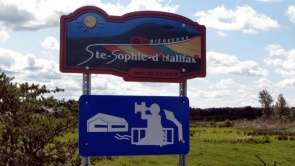 A welcome sign advertising the Sainte-Sophie Municipality's tourist attractions