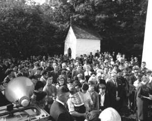 Pilgrims gathered around the three chapels