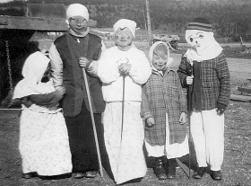 Some very young Mid-Lent revellers from Mavilette, Nova Scotia, circa 1953, Collection Centre Acadien, Université Sainte-Anne