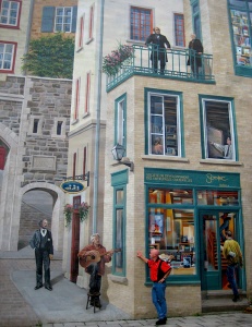 La fresque des Québécois, à Québec: on y voit Félix et sa guitare à l'avant-plan, semblant fredonner à l'oreille des visiteurs