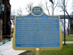 Memorial plaque honouring Father Potier erected on the south bank of the Detroit River (present-day Windsor, Ontario)